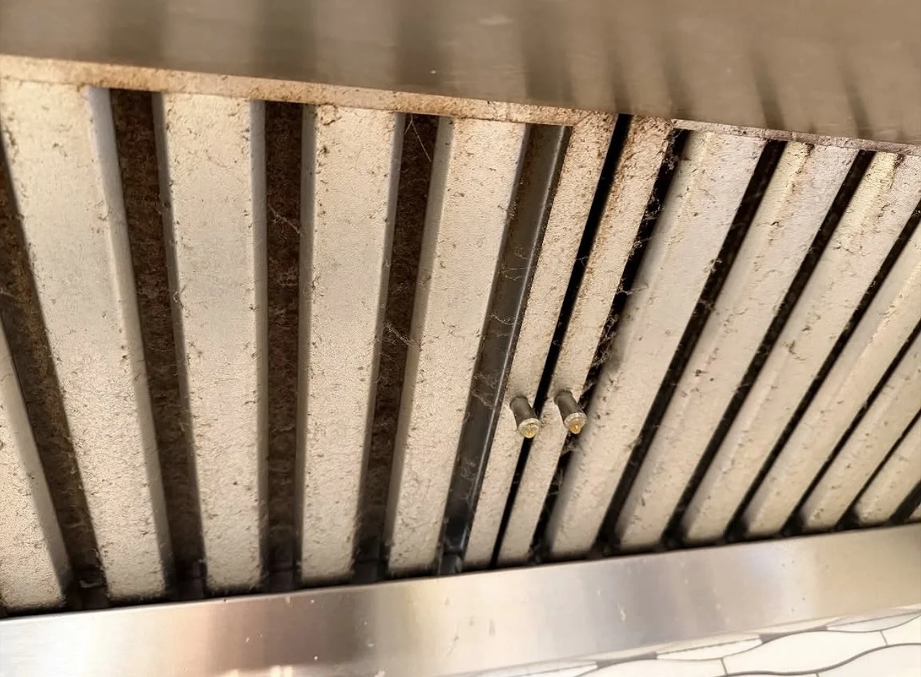 Range hood area before cleaning